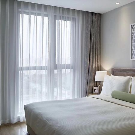 One Sunland Serviced Suites Managed By Lanson Place Шанхай Екстериор снимка