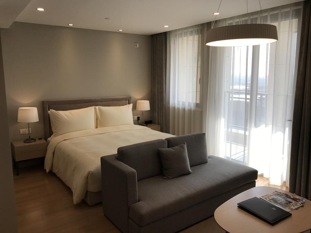 One Sunland Serviced Suites Managed By Lanson Place Шанхай Стая снимка